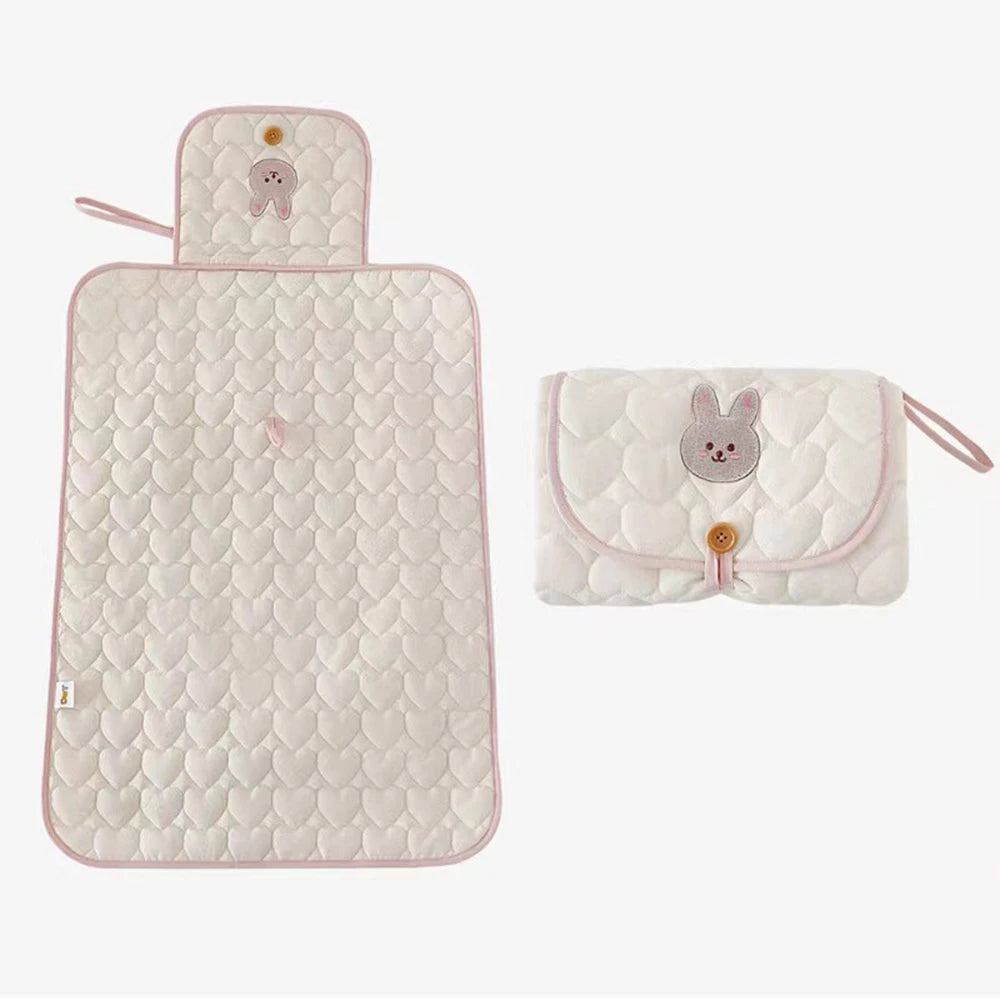 Matelas à langer portable Lullaby – Imperméable et doux (unisexe)