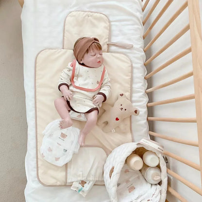 Matelas à langer portable Lullaby – Imperméable et doux (unisexe)