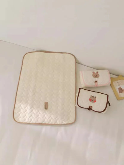 Matelas à langer portable Lullaby – Imperméable et doux (unisexe)