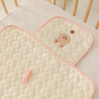 Matelas à langer portable Lullaby – Imperméable et doux (unisexe)